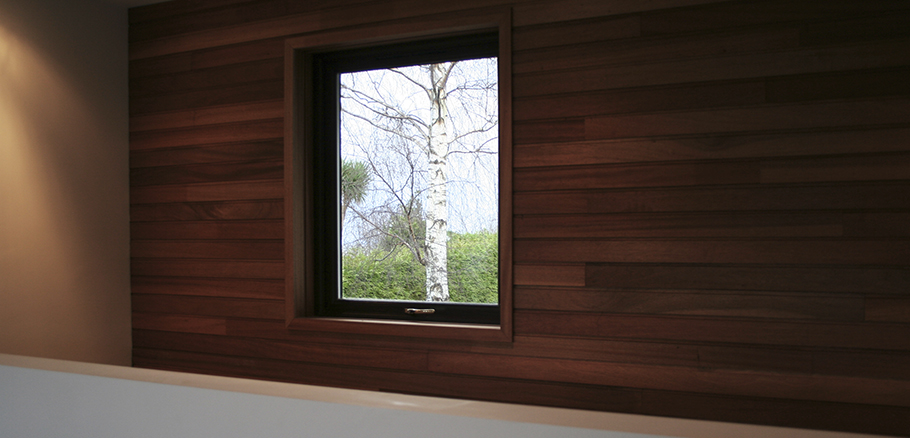 Reclaimed cedar cladding used as internal wall finish.