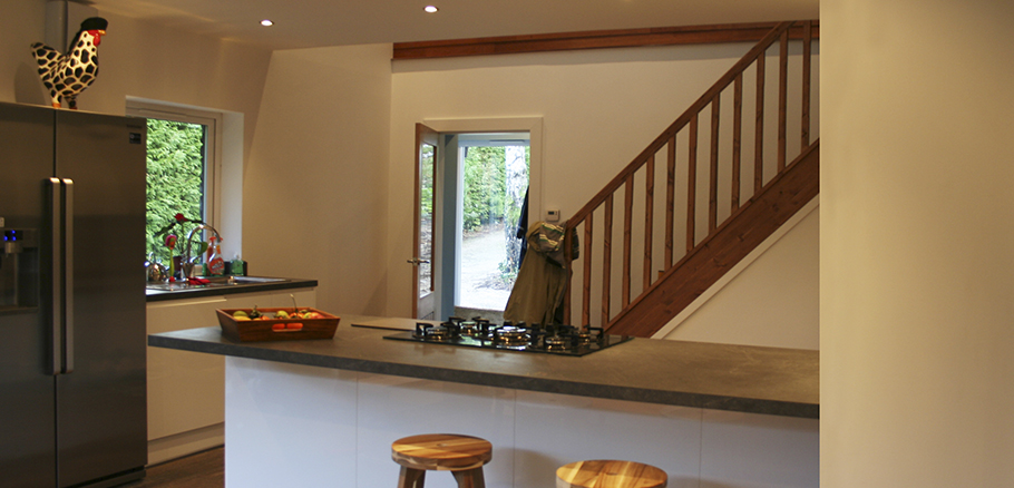 Internal renovation of split level accommodation, reconfigured circulation to create open plan dining kitchen in previous garage space.