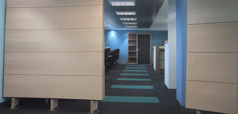 Modern office interior with timber screen.